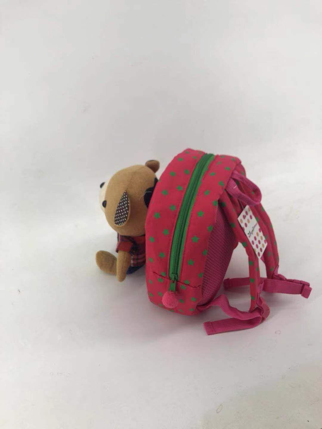 Rucksack with a safety leash - pink