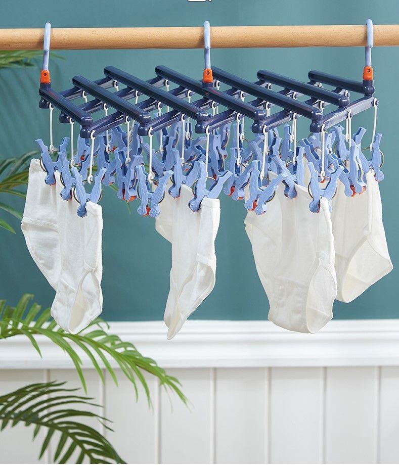 Plastikowy składany wieszak na ubrania z klipsami – 14 klipsów - jasnoniebieski