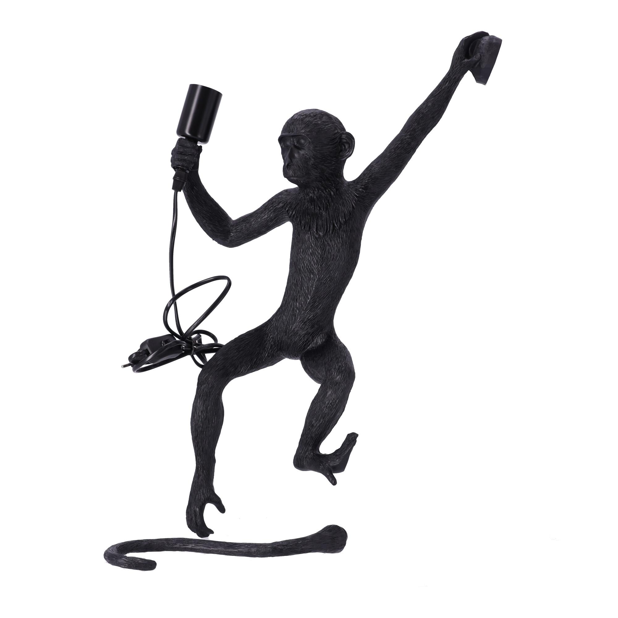 Stylowa lampa ścienna - małpka (lewa łapka)
