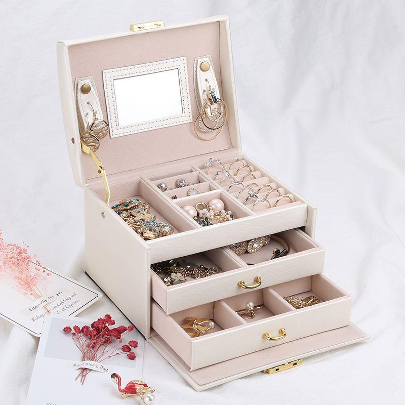 A multi-level casket, a jewelery box - dark pink