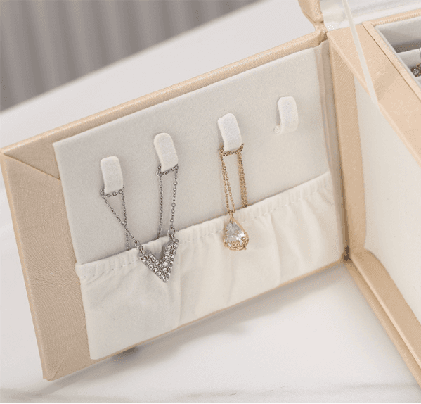 A multi-level casket, a jewelery box - gold