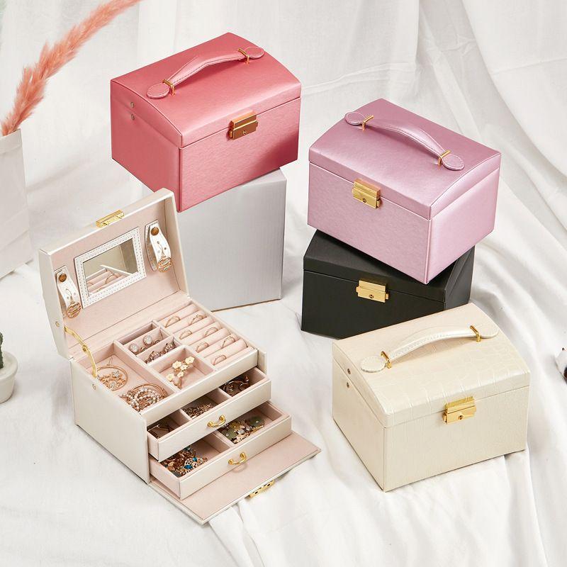 A multi-level casket, a jewelery box - light pink