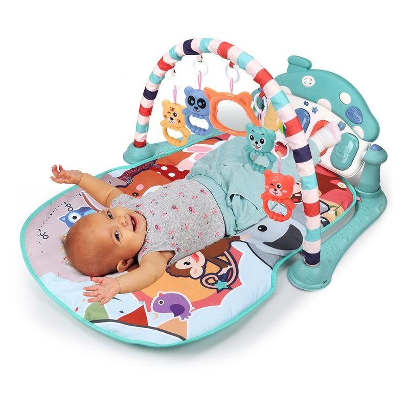 Educational mat for babies with a piano - green
